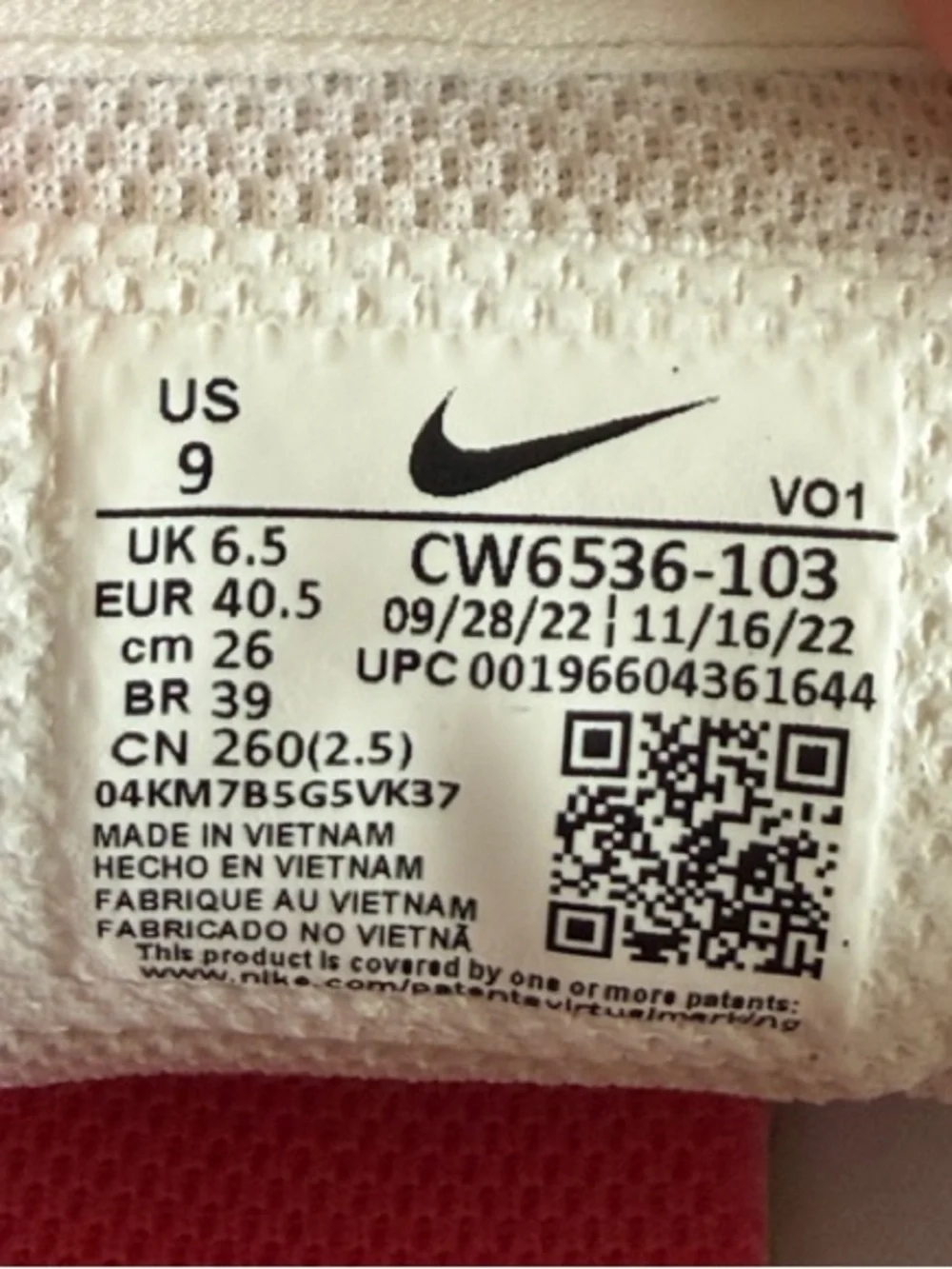 Nike Women’s White Sneakers with Pink Heel Tabs